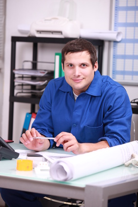 Mechanic sitting in office